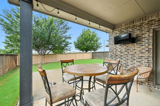 Fenced backyard featuring a patio. Gas and Waterline available for outdoor kitchen | Image 25