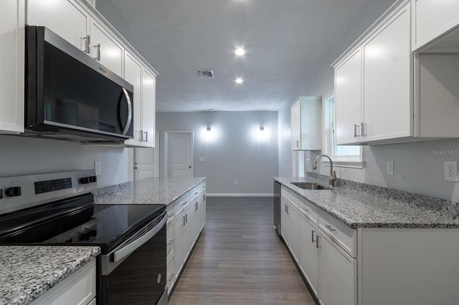 7544 Se 78 Th Pl, House other with 3 bedrooms, 2 bathrooms and null parking in TRENTON FL | Image 13