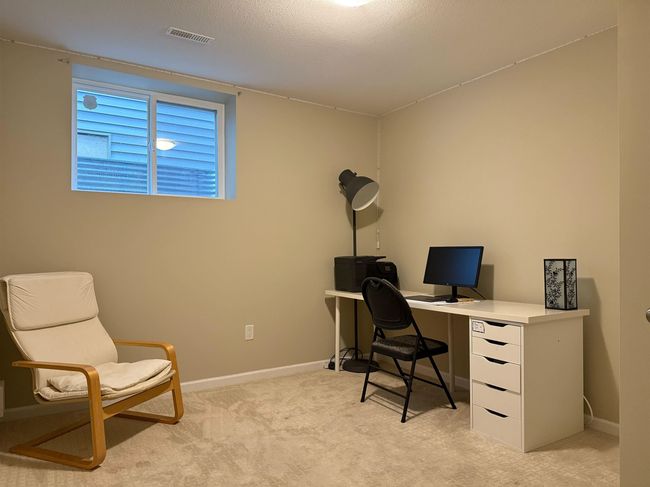 Office with baseboards, light colored carpet, and visible vents | Image 30