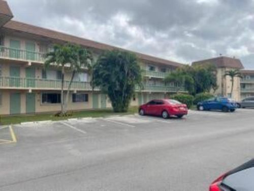 202-400 Village Green Cir W, Palm Springs, FL, 33461-6518 | Card Image