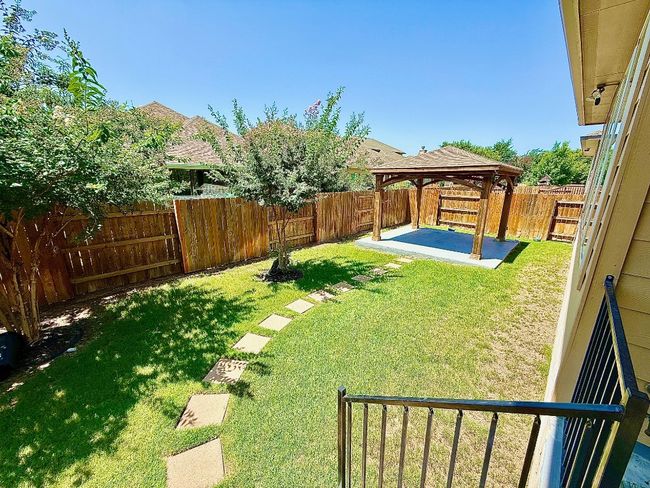 View of yard featuring a gazebo and a patio area | Image 33