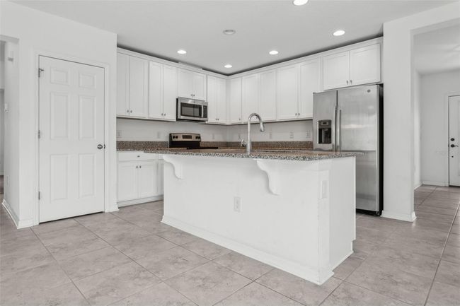 18858 Alfaro Loop, House other with 4 bedrooms, 2 bathrooms and null parking in SPRING HILL FL | Image 8