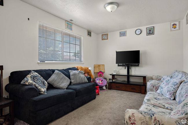 Living room featuring carpet flooring | Image 10