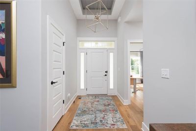 Entrance foyer featuring light hardwood / wood-style flooring | Image 2