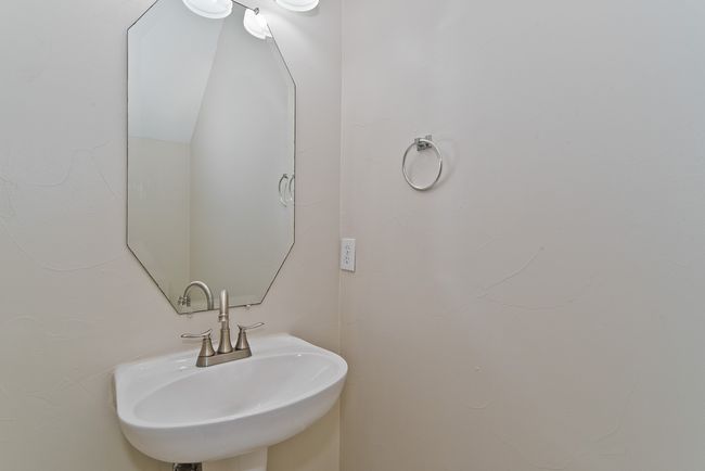 Downstairs Powder Room. | Image 16
