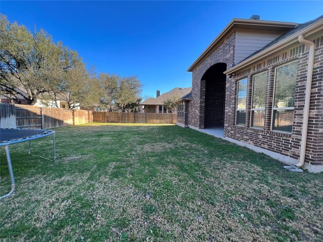Great sized backyard with covered patio!! | Image 30