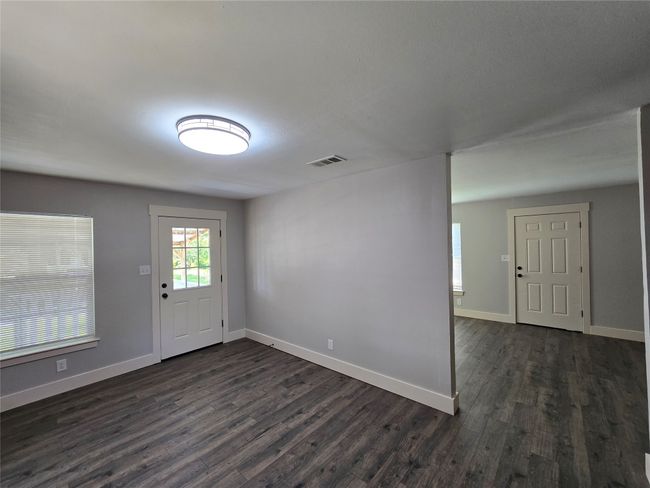 Foyer with dark wood finished floors | Image 4