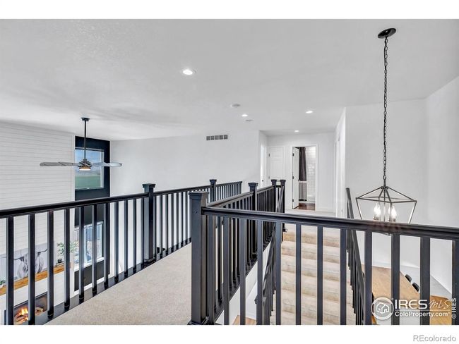 Two story living room creates an open feel throughout! | Image 19