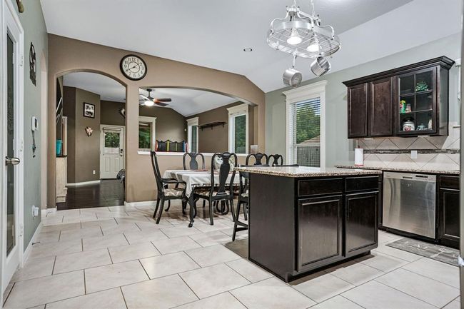 Kitchen opens to dining area & living room! | Image 7