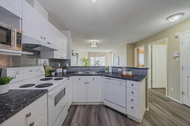 1311 - 950 Arbour Lake Rd Nw, Condo with 2 bedrooms, 1 bathrooms and 1 parking in Calgary AB | Image 10