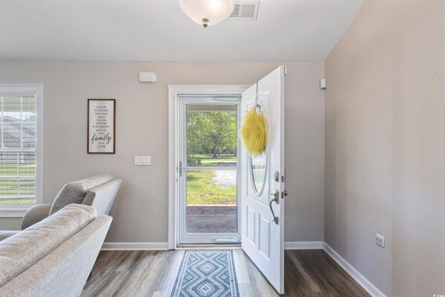 Entrance foyer featuring wood finished floors | Image 7