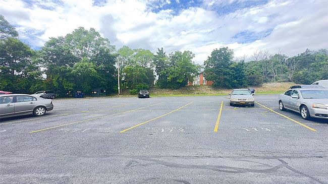 View of uncovered parking lot Parking spot is 173 | Image 13