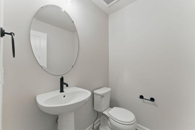 Main floor half bath | Image 12