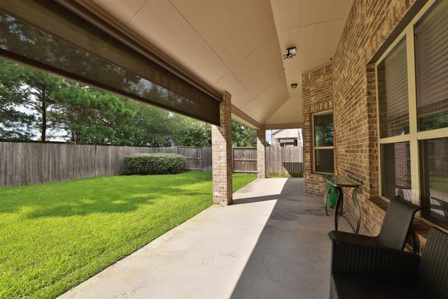 Woow... this covered patio with sun shade measures 37x16. Ready for an outdoor kitchen | Image 36