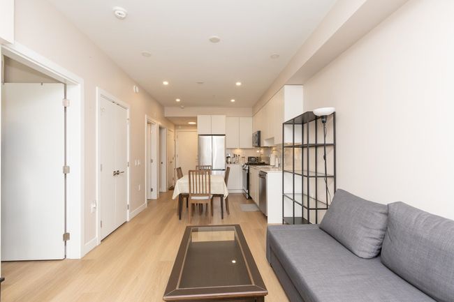 Living room featuring baseboards, recessed lighting, and light wood finished floors | Image 4