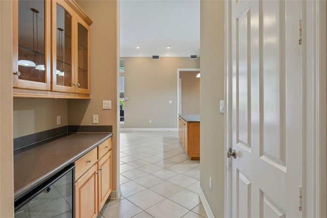 Butlers pantry right off the kitchen with wine fridge and great storage space - next to large walk in pantry. | Image 17