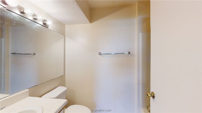 Bathroom featuring toilet and vanity | Image 15