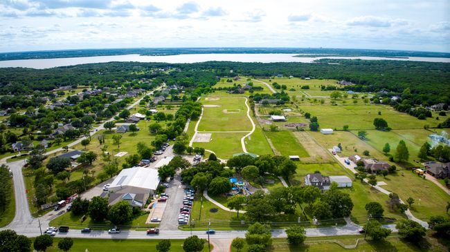 Aerial view of community and Lake Lewisville with boat dock. | Image 40