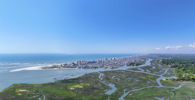 Aerial view of property and surrounding area with a large body of water | Image 30