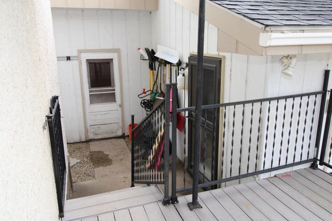 Service Door Entry to garage on right | Image 34