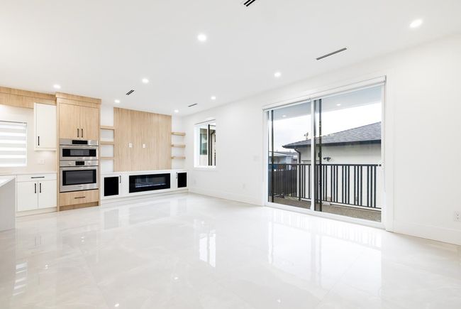 Unfurnished living room featuring recessed lighting | Image 8