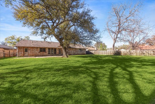Huge backyard with oak tree | Image 6