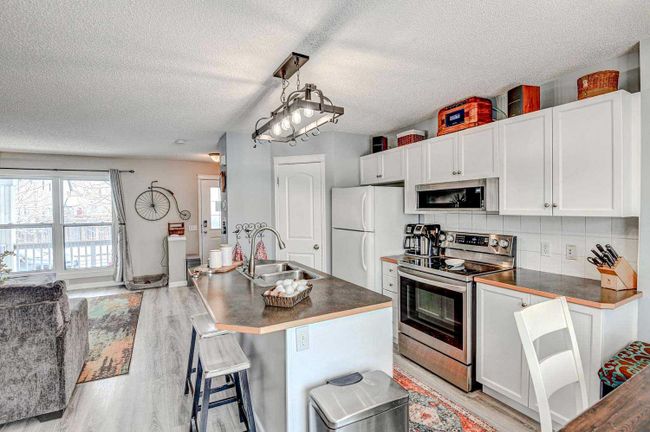 93 Prestwick Rise Se, Home with 3 bedrooms, 1 bathrooms and 2 parking in Calgary AB | Image 10