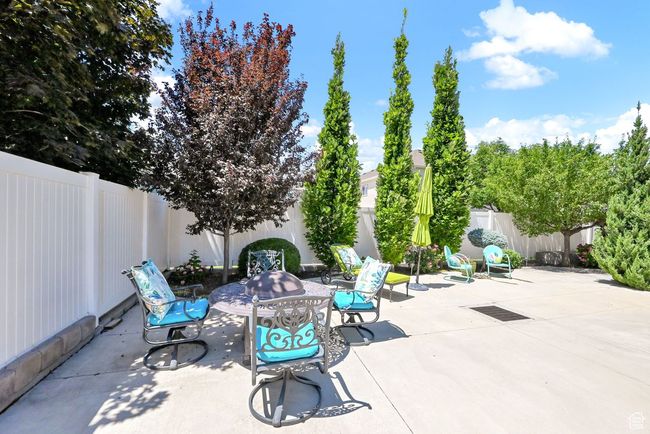 View of patio featuring a fenced backyard | Image 45