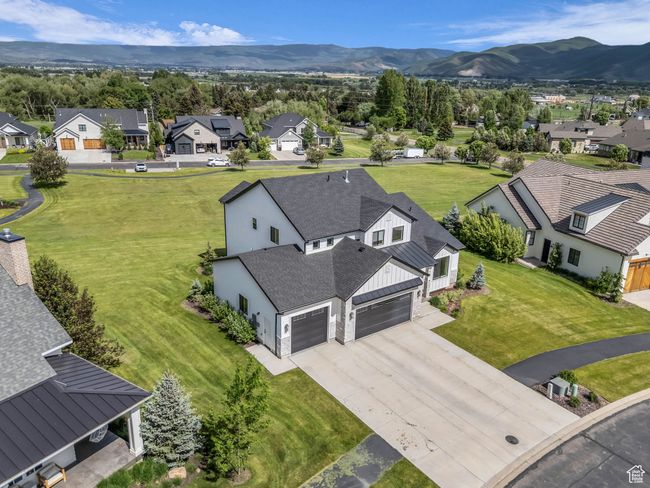 Aerial perspective of suburban area with a mountain backdrop | Image 51
