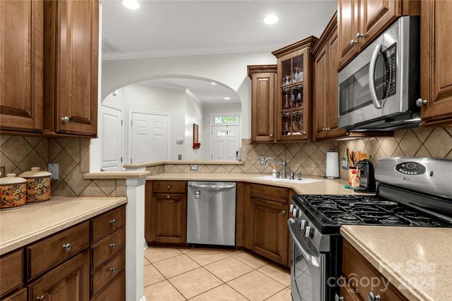 Equipped with gas range and overhead microwave | Image 7