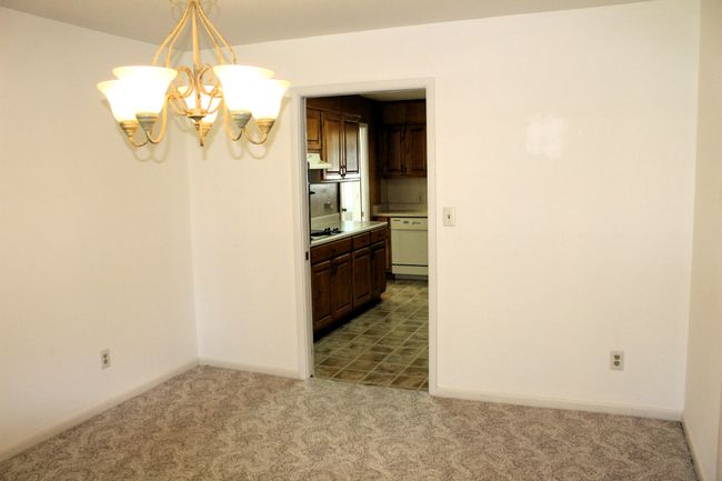 Easy access from the kitchen to the formal dining room!! There is a pocket door that can be closed!! | Image 12