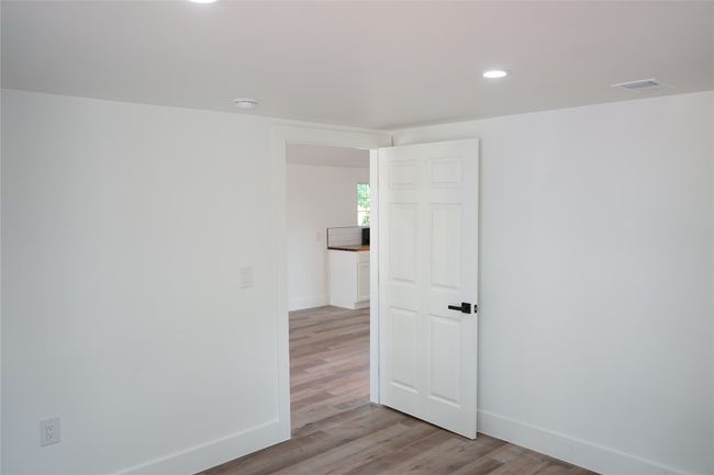 Spare room with light wood-style flooring and recessed lighting | Image 5