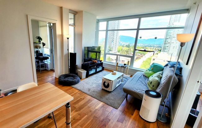 Living area featuring wood finished floors | Image 5