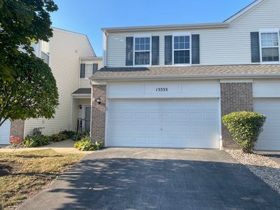 15335 Kenmare Circle, Townhouse with 2 bedrooms, 1 bathrooms and 2 parking in Manhattan IL | Image 1