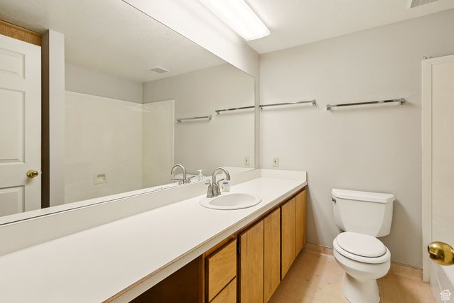 Bathroom with toilet and vanity | Image 25