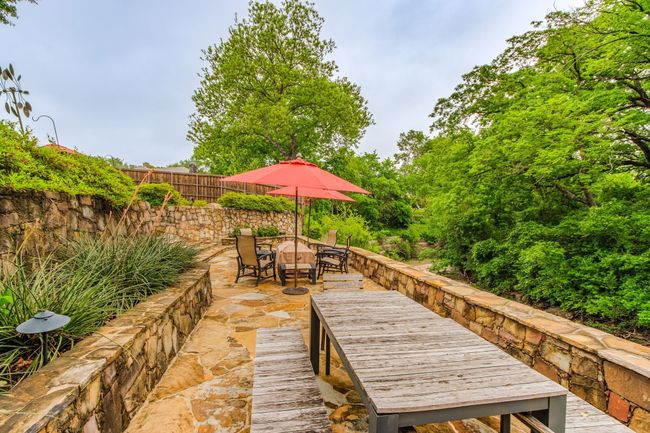 Plenty of patio space for relaxing and dining | Image 28