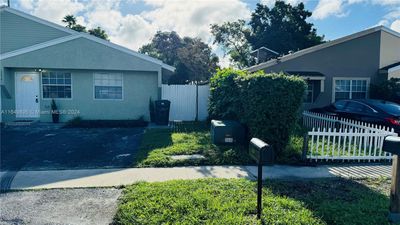 1254 Sw 71st Ter, Townhouse with 3 bedrooms, 2 bathrooms and null parking in North Lauderdale FL | Image 1