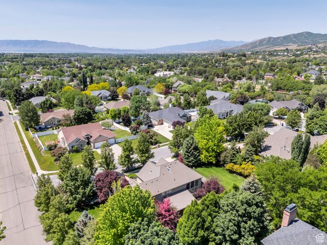 Aerial view of residential area featuring mountains | Image 35
