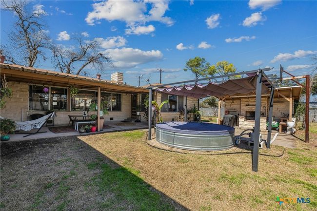 Starlit soaks in the Cowboy pool, movie nights on the porch, and plenty of room to garden, roam, or keep chickens - this backyard’s got stories to tell | Image 19