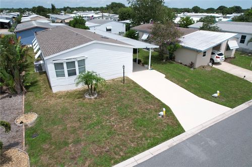 908 Bougainvillea Cir, Barefoot Bay, FL, 32976-7689 | Card Image