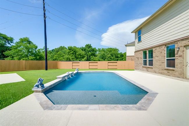 Don’t miss the incredible backyard oasis—complete with a sparkling in-ground pool and your very own half-court basketball setup, perfect for entertaining, relaxing, and staying active right at home! | Image 16