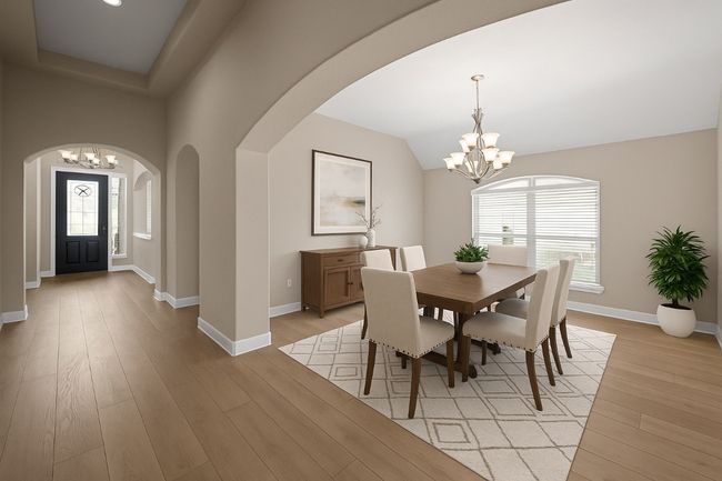 Dining space with a chandelier, arched walkways, light wood-type flooring, and vaulted ceiling | Image 20