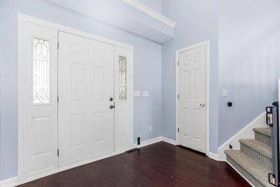 Foyer entrance with dark hardwood / wood-style flooring | Image 3