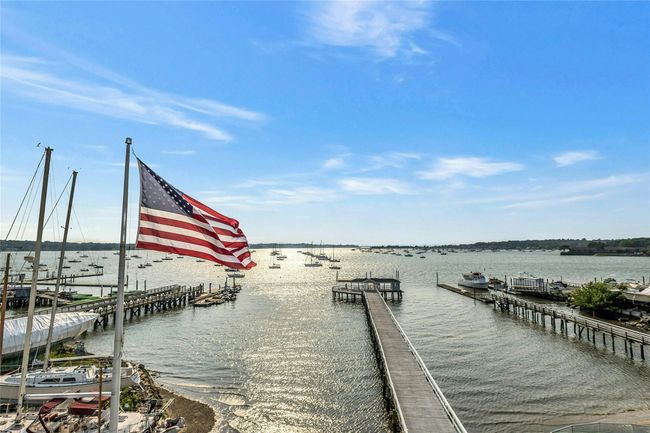 Dock featuring a water view | Image 31