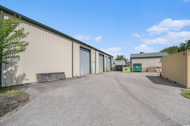 View of outbuilding with community garages | Image 33