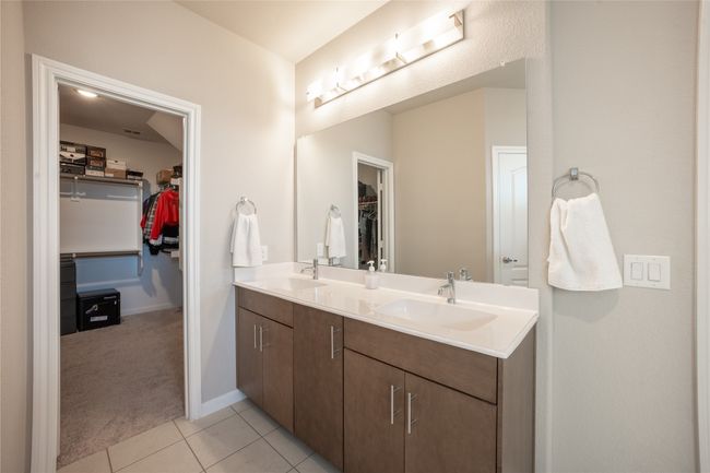 Bathroom with tile patterned flooring and vanity | Image 17