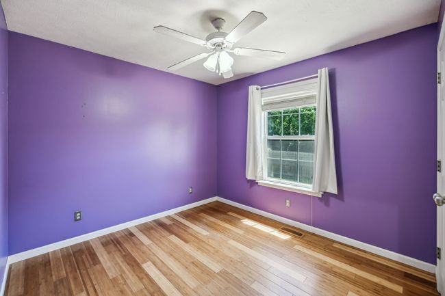 The third bedroom would be a perfect princess room with more of the gorgeous bamboo flooring, ample closet space, and a ceiling fan! 2095 Bolden Drive, Murfreesboro, TN 37127 | Image 20