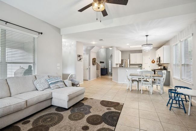 The kitchen is open to the living room | Image 12