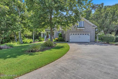 301 Wisteria Way, Caswell Beach, NC, 28465-8025 | Card Image