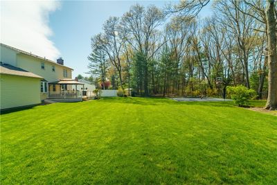 Spacious backyard complete with a lit basketball court! | Image 3